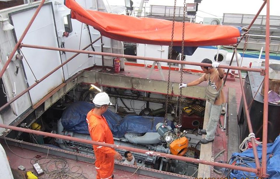 Crew working on the deck of a vessel
